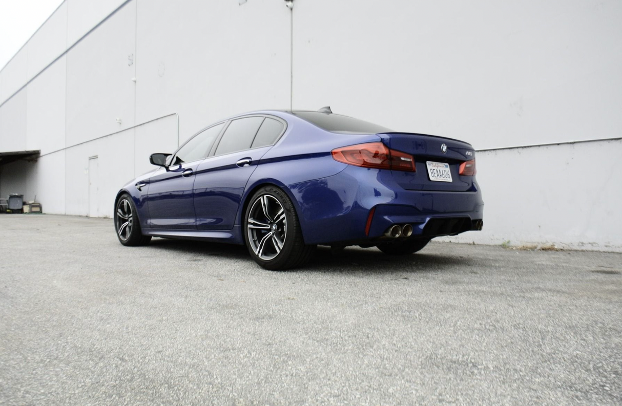 Megan Racing® BMW M5 F90 Supremo 304SS 2.5" Axle-Back Exhaust wtih Quad 4" OD Black Tips